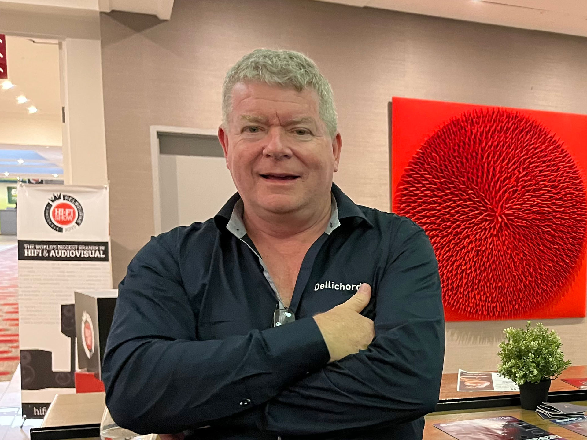 andrew hutchison designer at dellichord loudspeakers at melbourne hifi show 2023